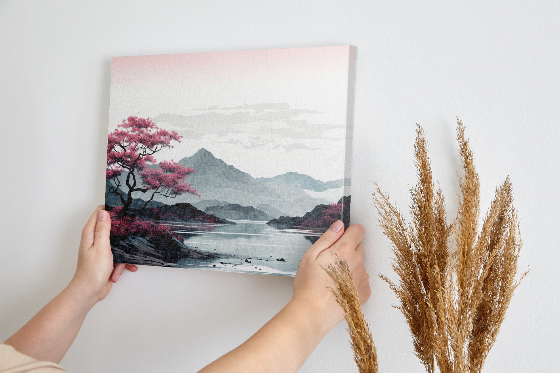 Framed canvas print of an oriental cherry blossom beside a reflective lake with mountain backdrop