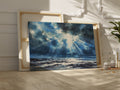 Watercolor canvas print of sunbeams shining through clouds onto the ocean