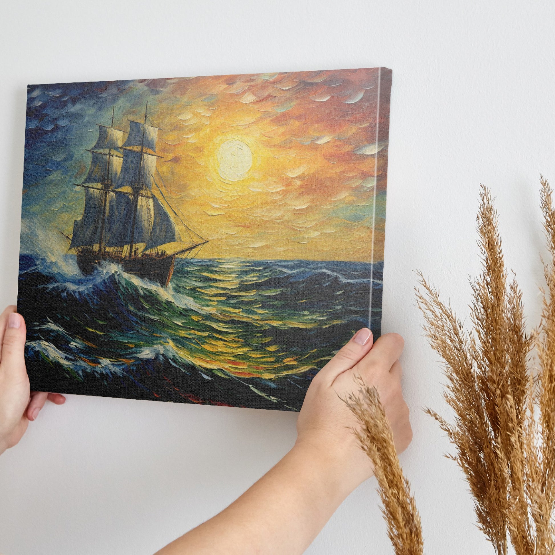 Framed canvas print of an impressionist painting featuring a sailing ship on vibrant sunset seas