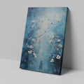 Framed canvas print of ethereal blue abstract painting with white flowers and a woman's silhouette