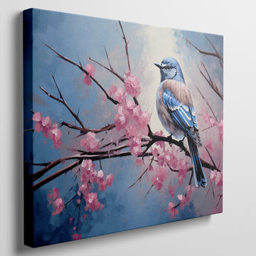 Framed canvas print of a bluebird perched on cherry blossom branches, with vibrant blue and pink hues