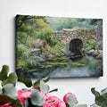 Framed canvas print of a serene watercolor painting of a rustic stone bridge over a calm pond with water lilies