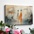 Framed canvas print of ethereal stylised women in a mystical, abstract landscape with orange and ivory tones