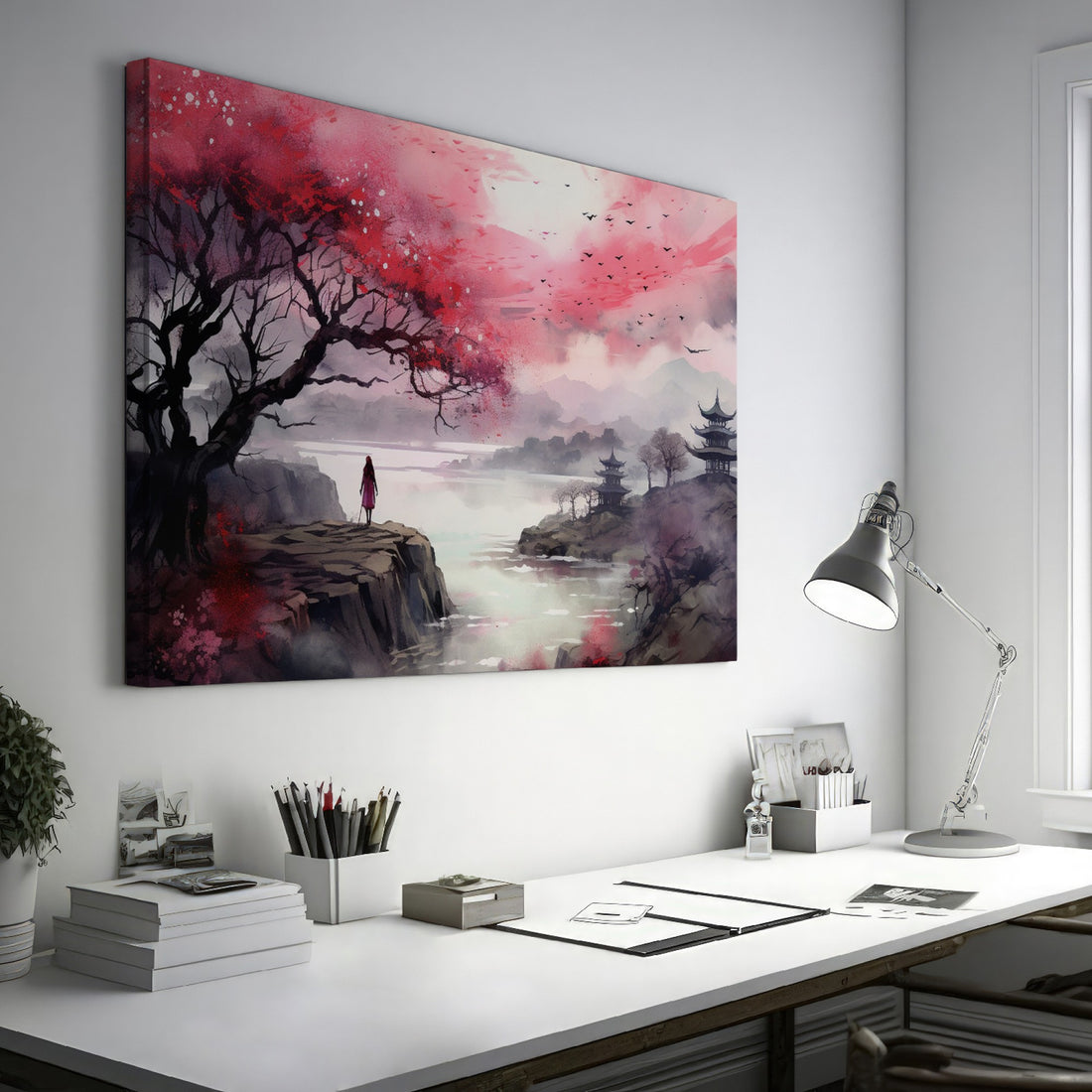 Framed canvas print of an oriental landscape with cherry blossoms, pagodas, and a silhouette of a person