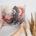 Framed canvas print of a traditional Japanese Geisha in watercolour with a misty backdrop of red and grey