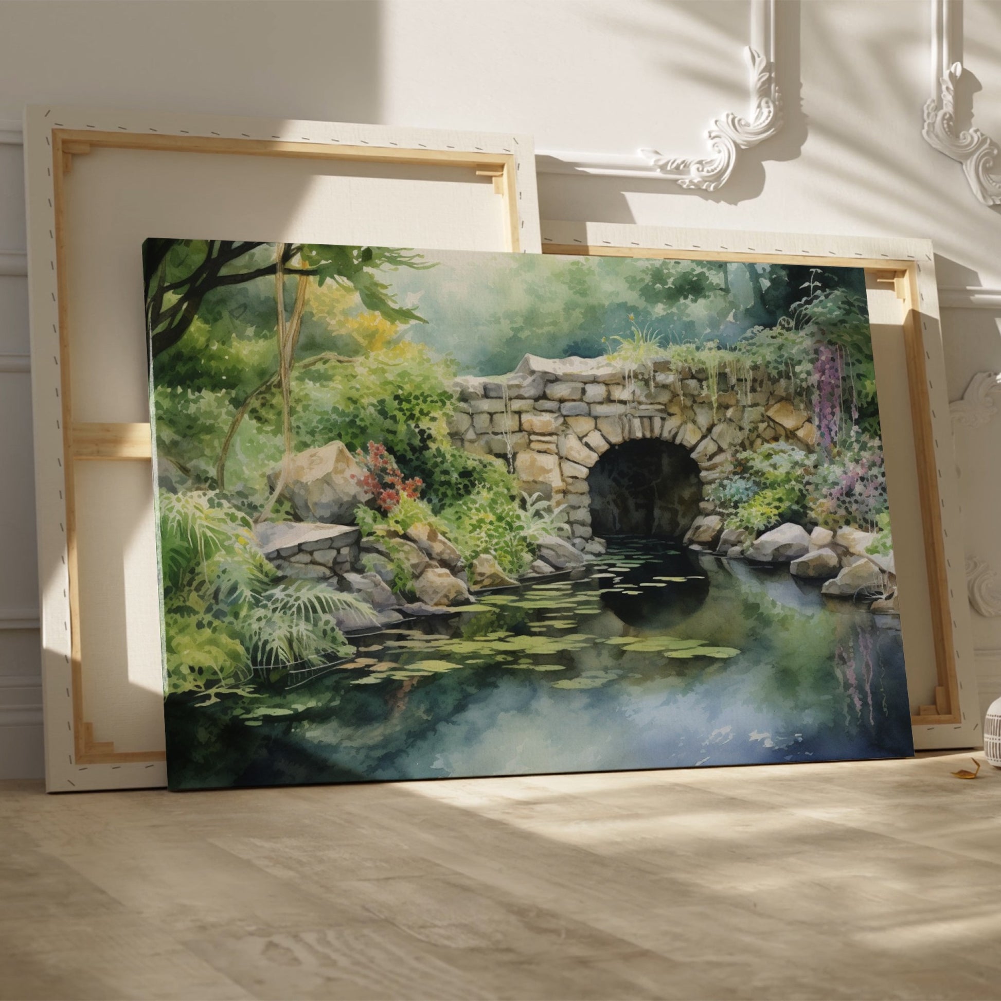 Framed canvas print of a serene watercolor painting of a rustic stone bridge over a calm pond with water lilies