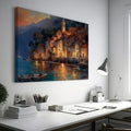 Framed canvas print of a watercolour Mediterranean village at twilight with reflections on the sea