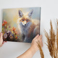 Framed canvas print of a majestic fox among vibrant wildflowers, with warm and impressionistic tones