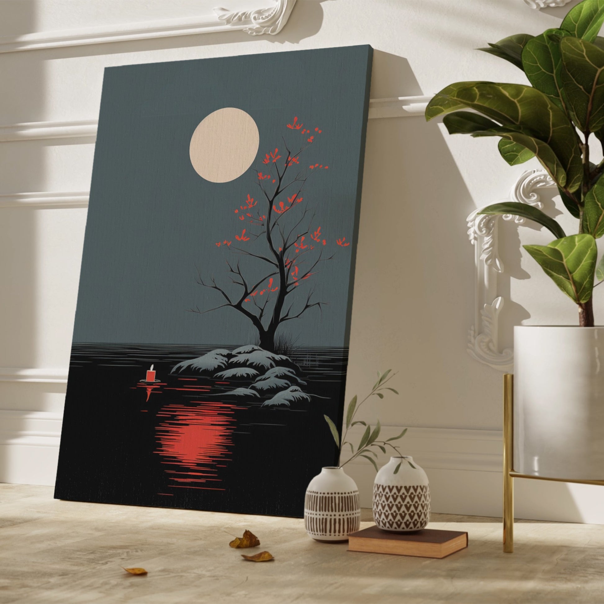 Framed canvas print of a minimalist tree at night with a glowing moon and red leaf accents