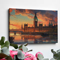 Framed canvas print of a colourful sunset over Big Ben and the London skyline, with stark reflections in the River Thames.