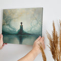 Framed canvas print of an ethereal woman amid a teal and gold enchanted forest