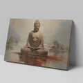 Framed canvas print of a meditative Buddha statue in warm earthy tones