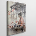 Framed canvas print of a Japanese tea ceremony with cherry blossoms and a woman in traditional attire