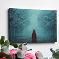 Framed canvas print of a girl in red standing in a mystical blue forest with butterflies