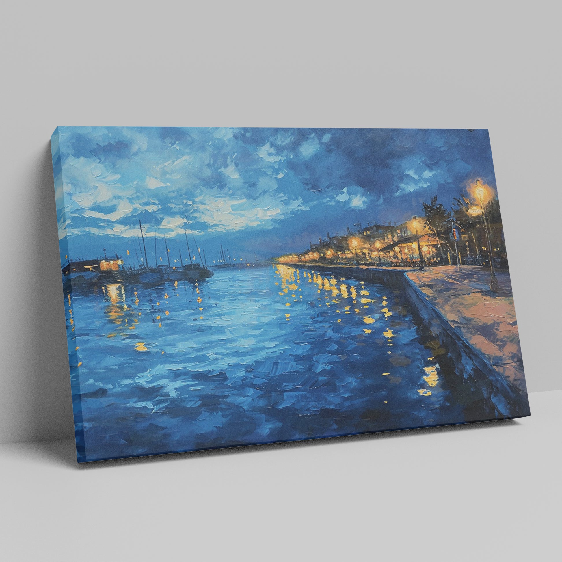 Framed canvas print of twilight seascape with vivid blue waters and illuminated harbour lights