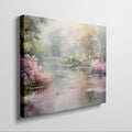 Framed canvas print of a serene impressionistic painting featuring a lake, azalea blooms, and a reflection of trees