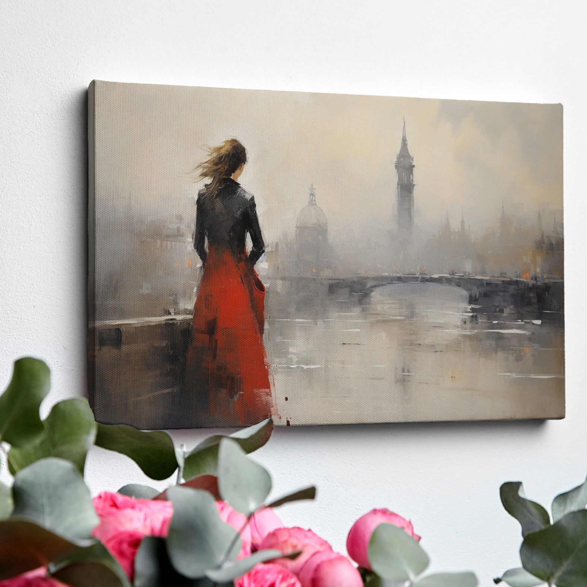 Framed canvas print of an elegant woman overlooking a misty cityscape with a red dress as a focal point