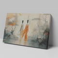 Framed canvas print of ethereal stylised women in a mystical, abstract landscape with orange and ivory tones