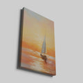 Framed canvas print of impressionistic sailboat at sunset with warm golden and orange tones