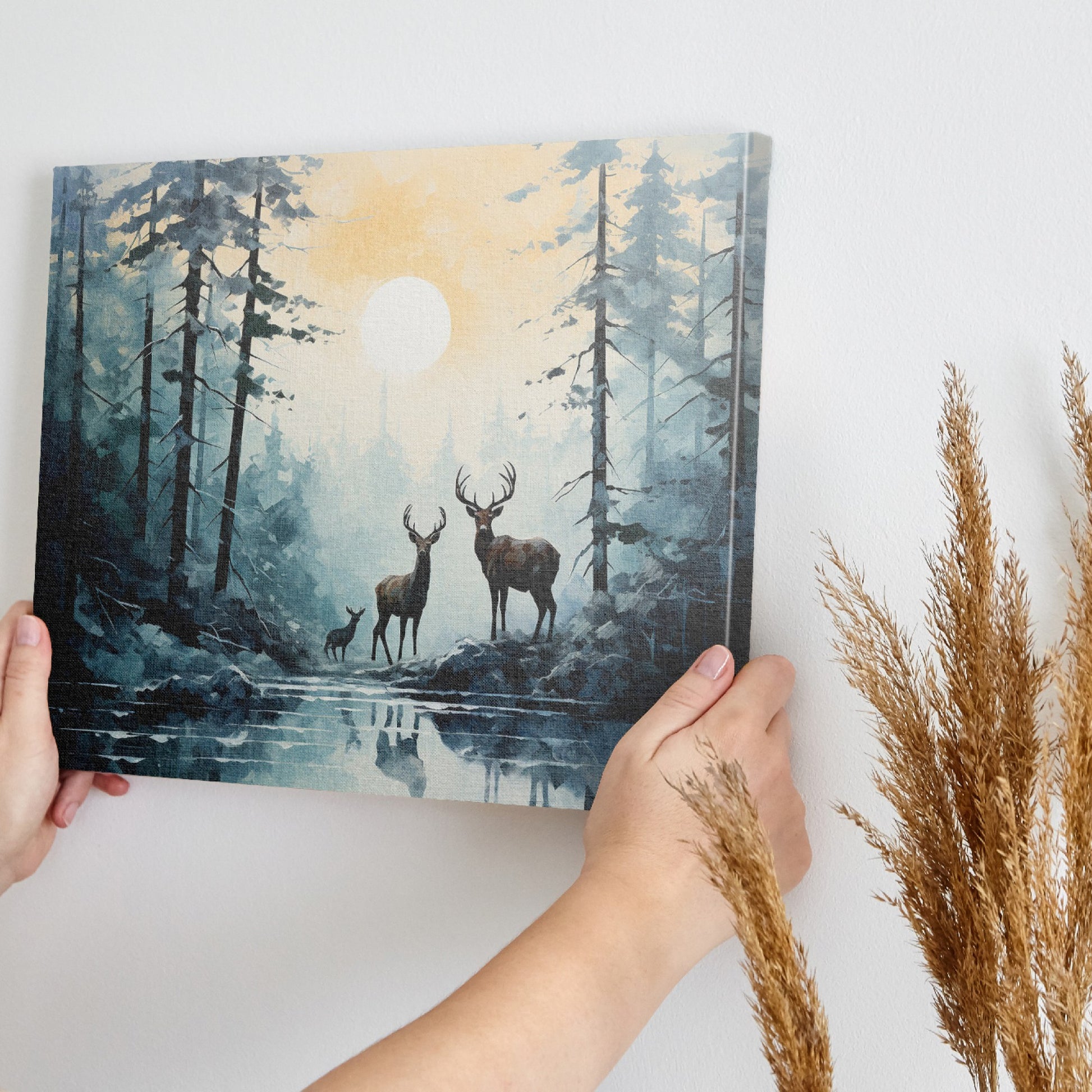 Framed canvas print of a serene forest scene with deer and sunset reflection