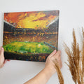 Framed canvas print of an abstract vibrant football stadium scene