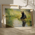 Framed canvas print of a bear sitting by a pond with floral surroundings