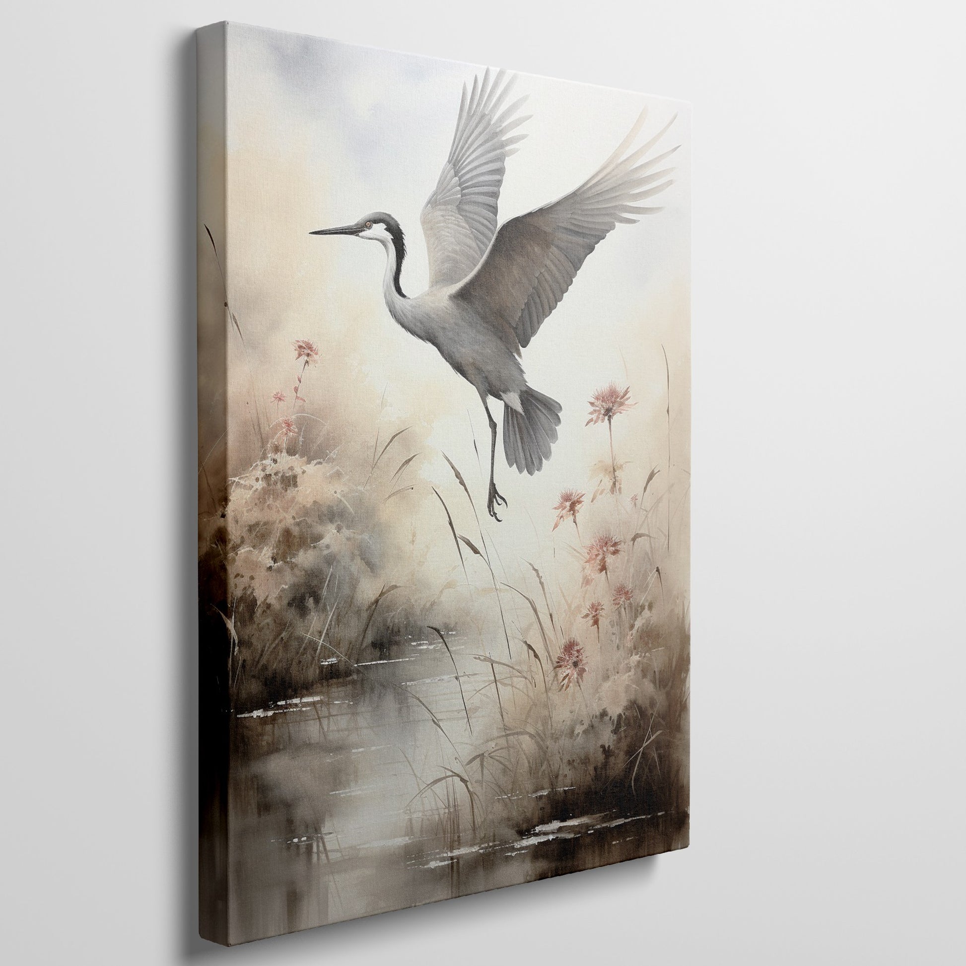 Framed canvas print of a heron soaring above a sepia-toned riverside scene with blooming reeds.