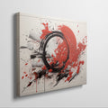 Framed canvas print of explosive red and black abstract art with dynamic splatters and bold strokes