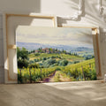 Framed canvas print of a Tuscan countryside panorama with a vineyard and rolling hills in watercolor style