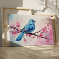 Framed canvas print of a bluebird and cherry blossoms in pastel watercolour