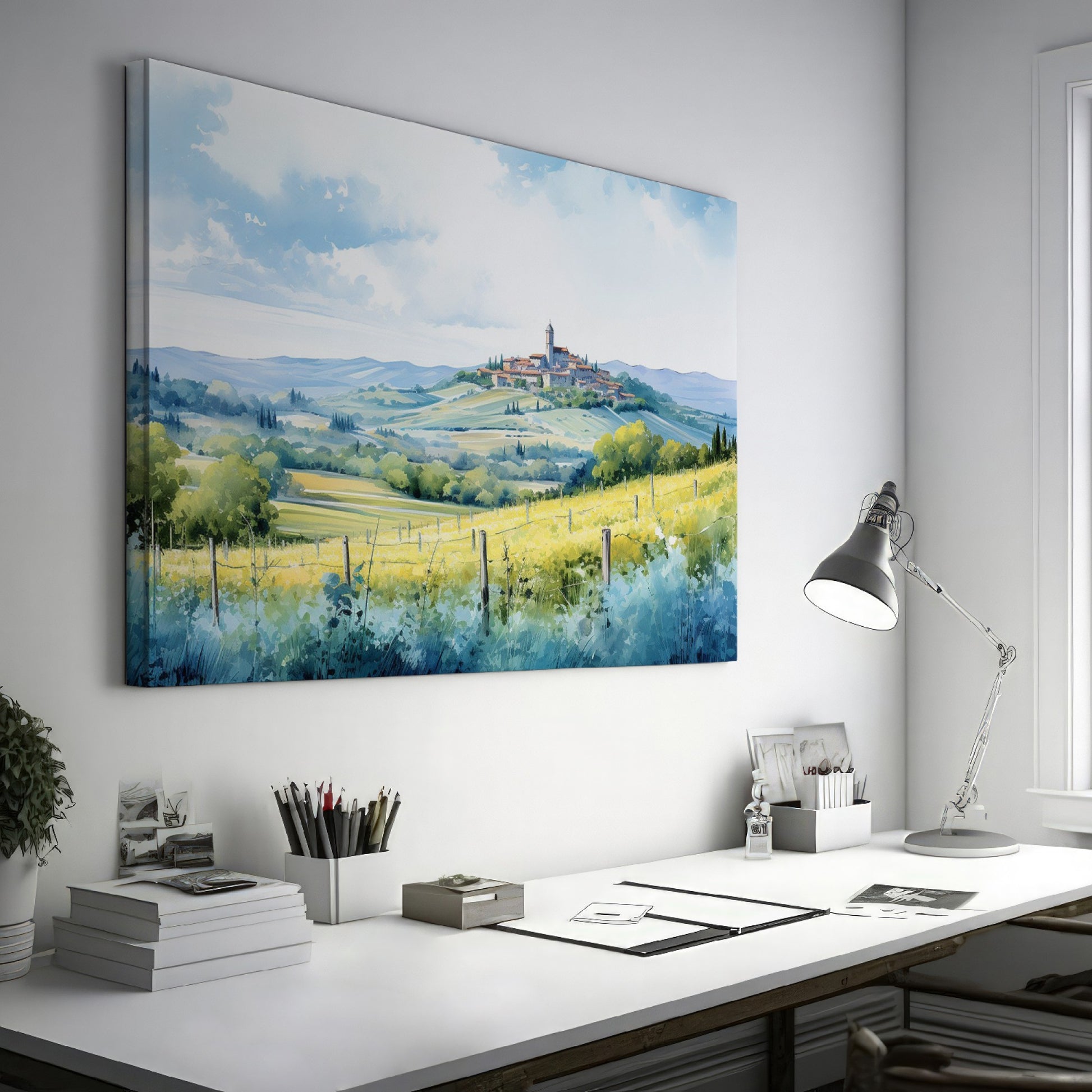 Framed canvas print of a Tuscan landscape with watercolor rolling hills and a village