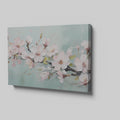 Framed canvas print of pastel cherry blossom flowers in impasto style