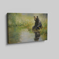 Framed canvas print of a bear sitting by a pond with floral surroundings