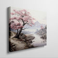 Framed canvas print of a serene cherry blossom landscape with mountains and a river