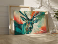 Framed canvas print of a colourful, impressionist painting of a stag with vibrant splashes of red, blue, and green