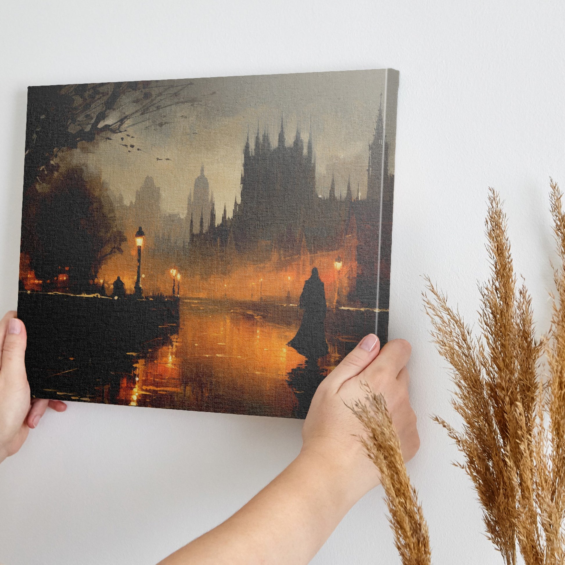 Framed canvas print of a gothic cityscape at twilight with warm glows and a shadowy figure