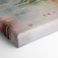 Framed canvas print of a serene impressionistic painting featuring a lake, azalea blooms, and a reflection of trees