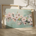 Framed canvas print of pastel cherry blossom flowers in impasto style