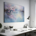 Framed canvas print of cherry blossoms over a tranquil lake with soft pastel colours and a pair of ducks