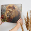 Framed canvas print of a realistic lion showcasing golden and warm earth tones, with detailed brushwork and a serene expression.