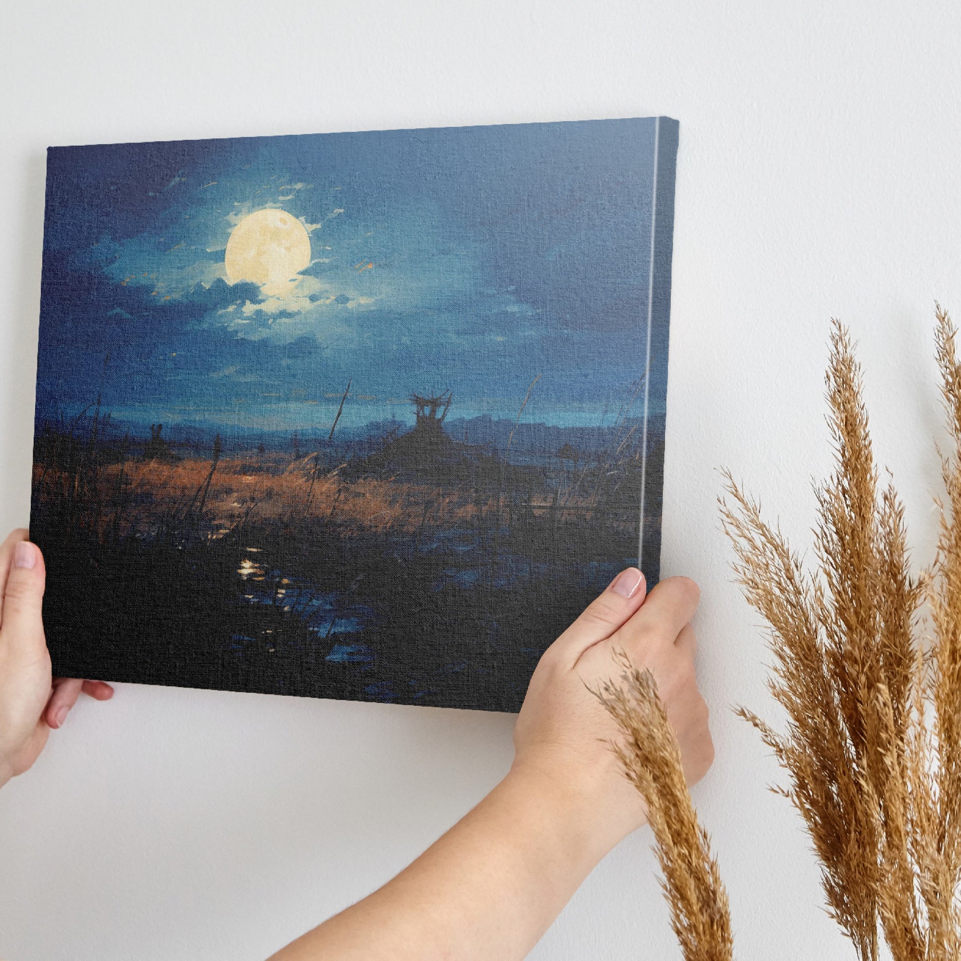 Framed canvas print of a moonlit rustic meadow with a full moon, golden tones and blue hues