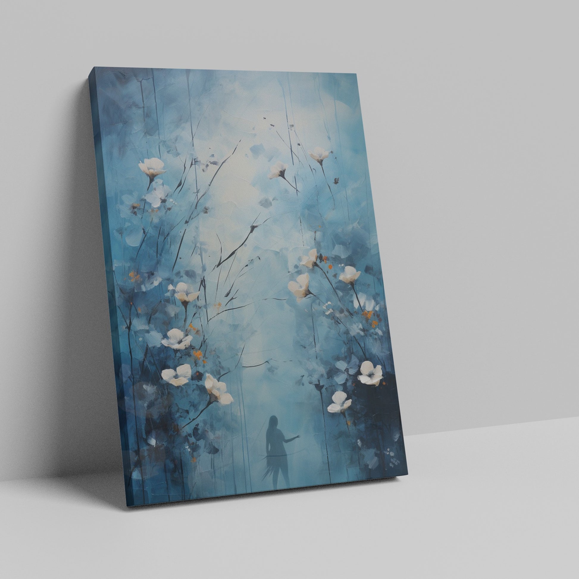 Framed canvas print of ethereal blue abstract painting with white flowers and a woman's silhouette