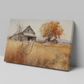 Framed canvas print of a rustic barn in autumn with golden fields and a leafy tree