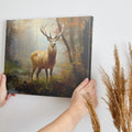 Framed canvas print of a majestic stag in a glowing autumn forest setting