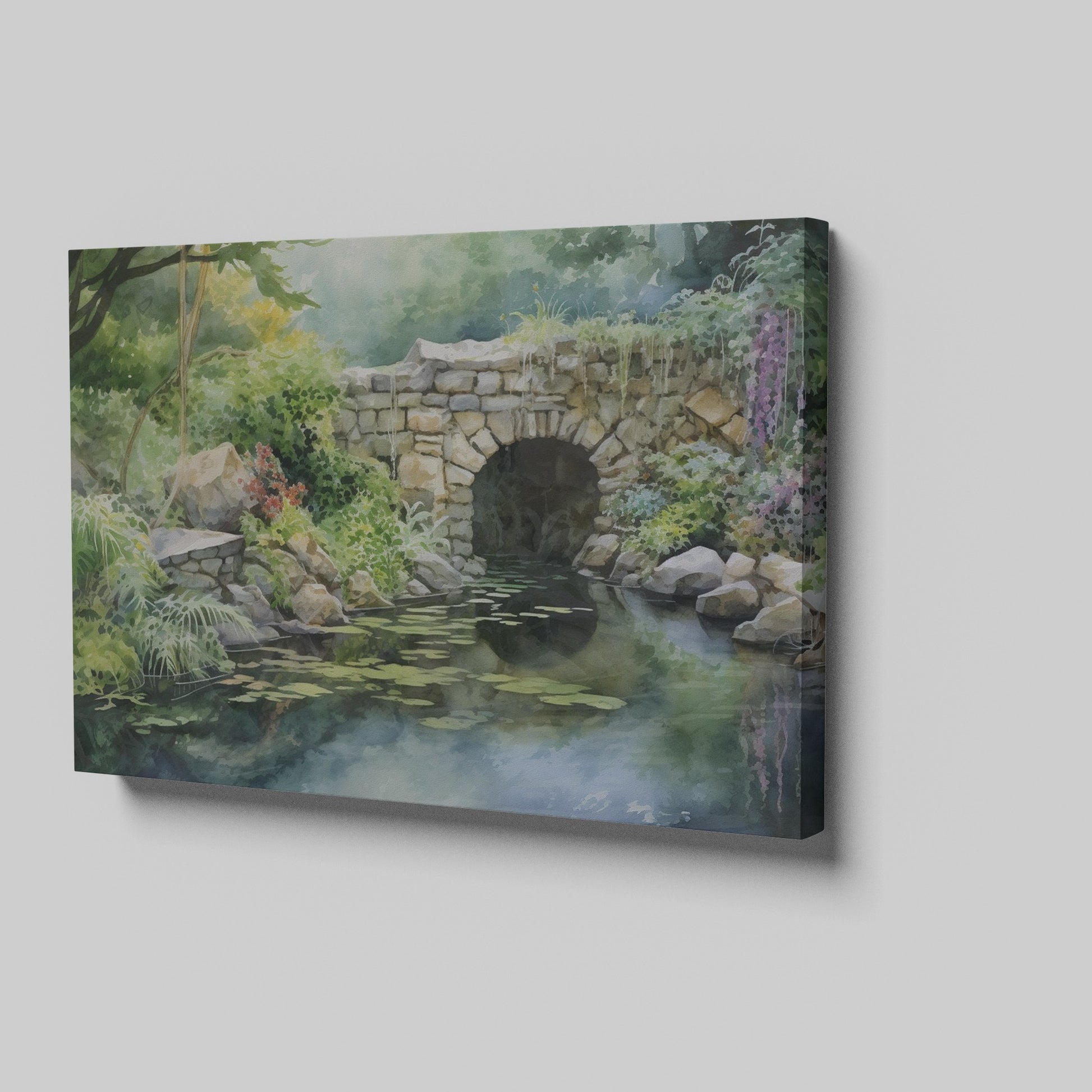 Framed canvas print of a serene watercolor painting of a rustic stone bridge over a calm pond with water lilies