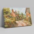 Framed canvas print of a charming English village scene with watercolour cottages in a rustic countryside setting