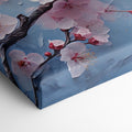 Framed canvas print of cherry blossoms with rain droplets on blue background