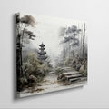 Framed canvas print of a misty oriental landscape with a pagoda and stone path