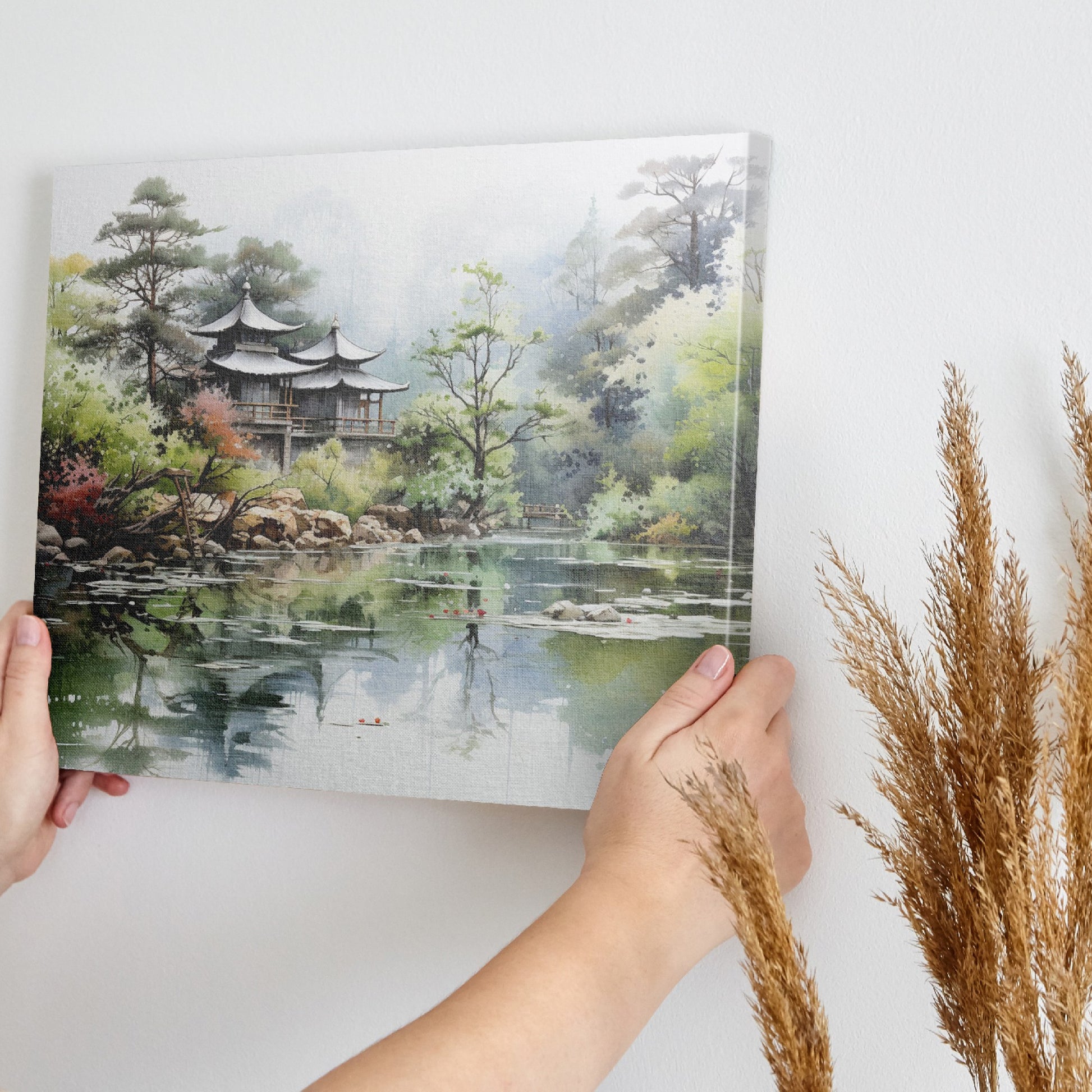 Framed canvas print of an Asian landscape with traditional pagoda and serene lake