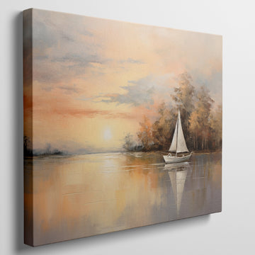 Framed canvas print of a sailboat during sunset with golden sky and water reflections